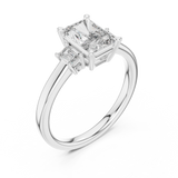 White gold lab grown diamond radiant cut three stone engagement ring, angled view