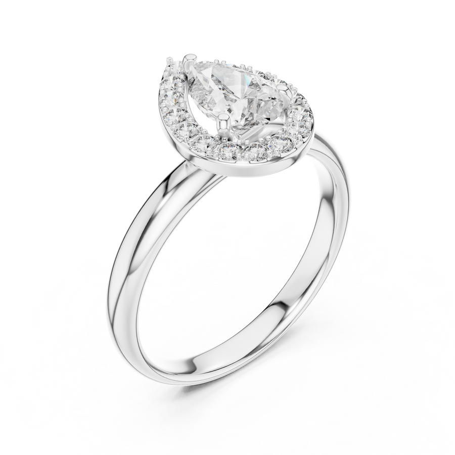 0.70 CT pear cut lab grown diamond halo engagement ring in white gold, angled view