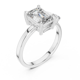 Rose gold 2 CT lab grown diamond emerald cut ring with asymmetric accents, front view — Luzora Jewels