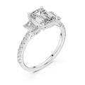 White gold emerald cut three stone lab grown diamond ring, side view