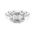 White gold emerald cut three stone lab grown diamond ring, angled view