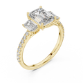 Yellow gold emerald cut three stone lab grown diamond ring, side view