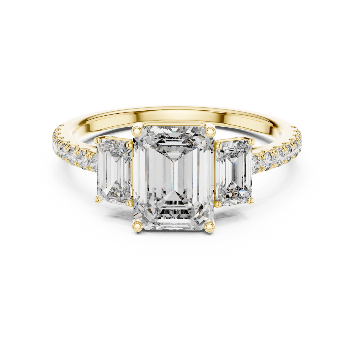 Yellow gold emerald cut three stone lab grown diamond ring, angled view
