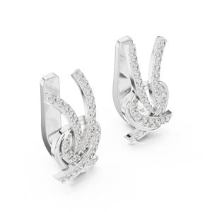 White gold lab grown diamond love knot huggie earrings, side view