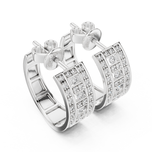 White gold pavé lab grown diamond huggie hoop earrings, angled side view