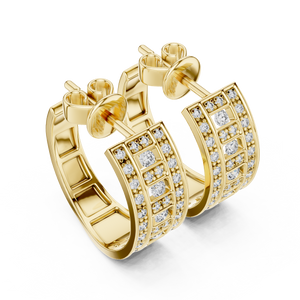 Yellow gold pavé lab grown diamond huggie hoop earrings, angled side view