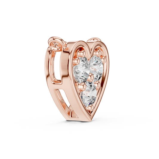 Side angle of rose gold three stone lab grown diamond heart pendant