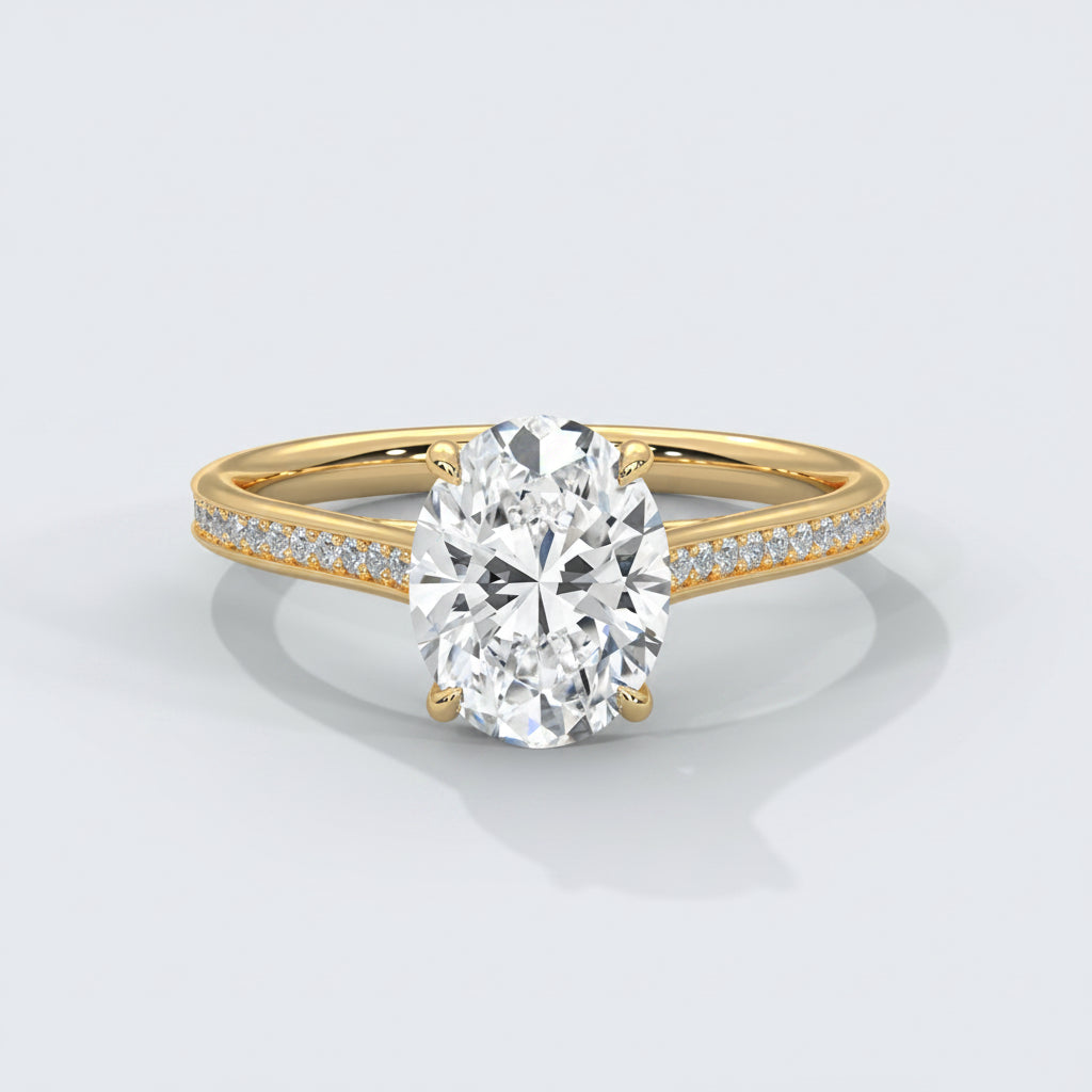 Gold ring with a large diamond and smaller diamonds on the band against a white background