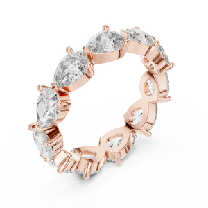 3 CT Pear Cut Lab Grown Diamond Eternity Ring in rose gold — angled view by Luzora Jewels