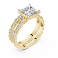 1.5 CT Princess Cut Lab Grown Diamond Split Shank Engagement Ring in yellow gold — angled view by Luzora Jewels