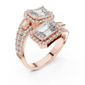 Rose gold lab grown diamond emerald cut toi et moi engagement ring, angled view