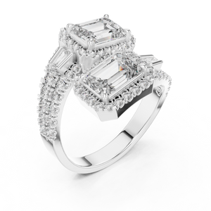 White gold lab grown diamond emerald cut toi et moi engagement ring, angled view