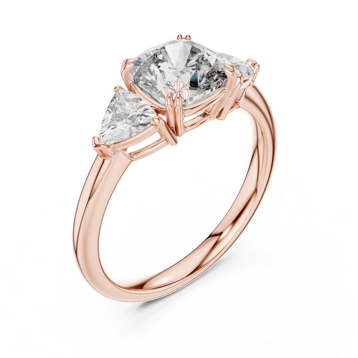 Rose gold lab grown diamond cushion cut three stone engagement ring, angled view