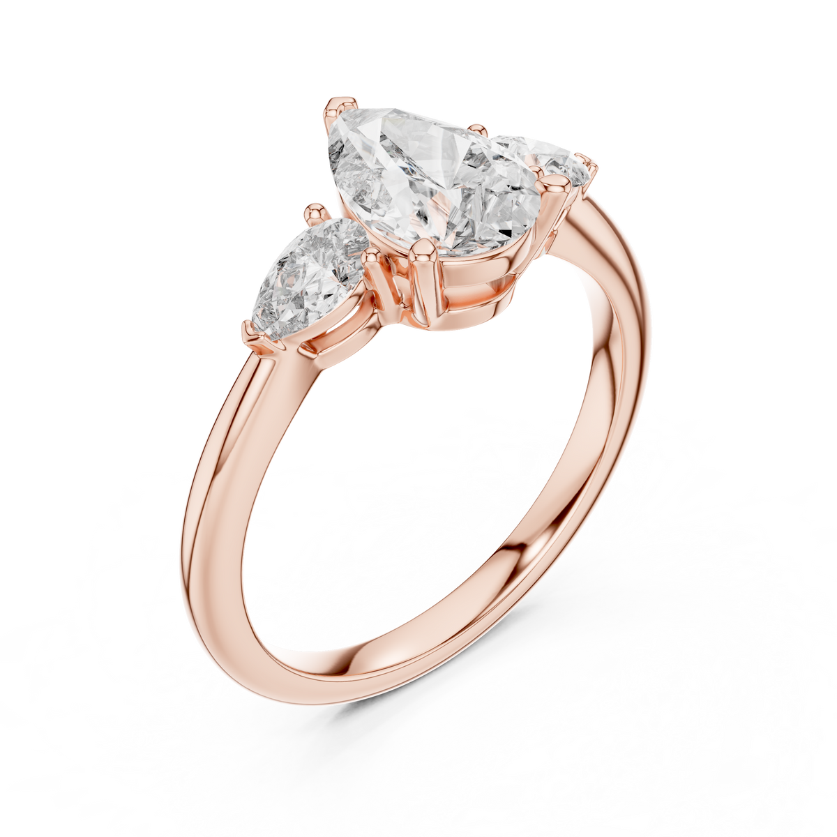 Rose gold lab grown diamond pear cut three stone engagement ring, angled view
