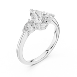 White gold lab grown diamond pear cut three stone engagement ring, angled view