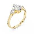 Yellow gold lab grown diamond pear cut three stone engagement ring, angled view