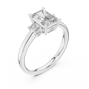 White gold lab grown diamond radiant cut three stone engagement ring, angled view