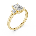 Yellow gold lab grown diamond radiant cut three stone engagement ring, angled view