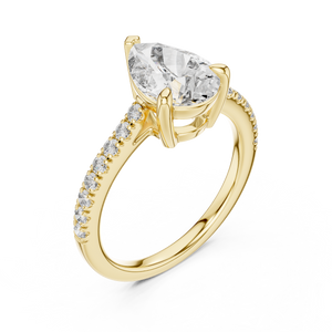 Yellow gold lab grown diamond pear cut solitaire engagement ring, angled view