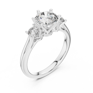 White gold lab grown diamond round cut three stone engagement ring, angled view