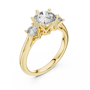 Yellow gold lab grown diamond round cut three stone engagement ring, angled view