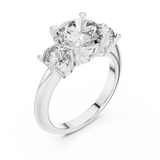 White gold lab grown diamond round cut three stone engagement ring, angled view