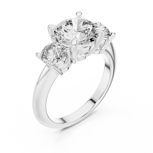 White gold lab grown diamond round cut three stone engagement ring, angled view
