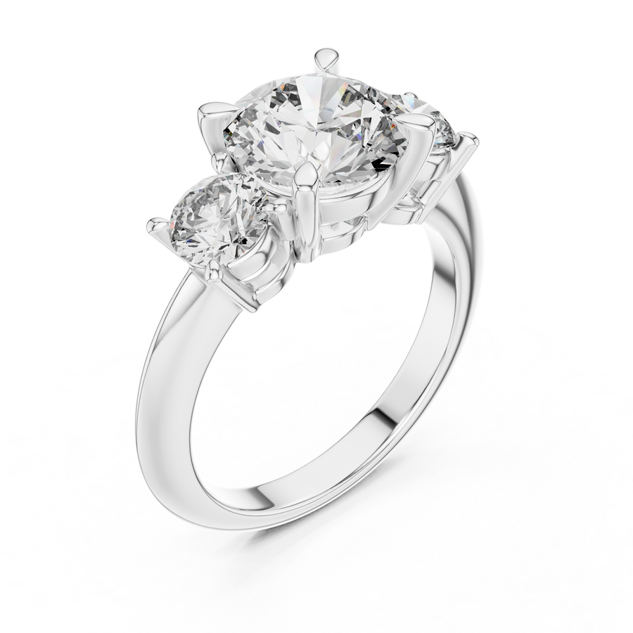 White gold lab grown diamond round cut three stone engagement ring, angled view