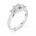 White gold lab grown diamond princess cut three stone engagement ring, angled view
