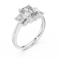 White gold lab grown diamond emerald cut three stone engagement ring, angled view