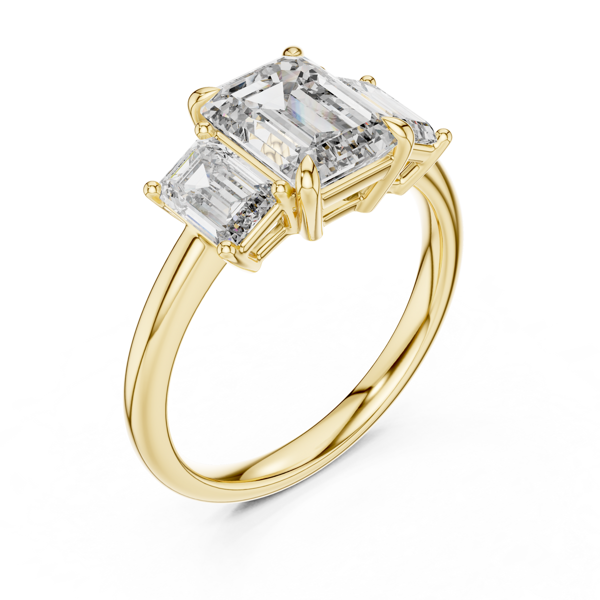 Yellow gold lab grown diamond emerald cut three stone engagement ring, angled view