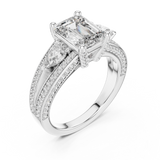 White gold lab grown diamond emerald and pear three stone engagement ring, angled view