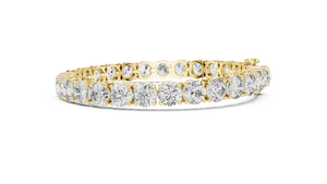 Yellow gold round diamond tennis bracelet, side view
