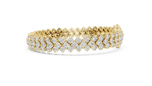 Yellow gold three-row diamond tennis bracelet, side view