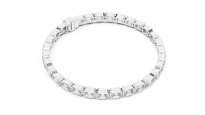 White gold emerald cut bezel set diamond tennis bracelet, angled view