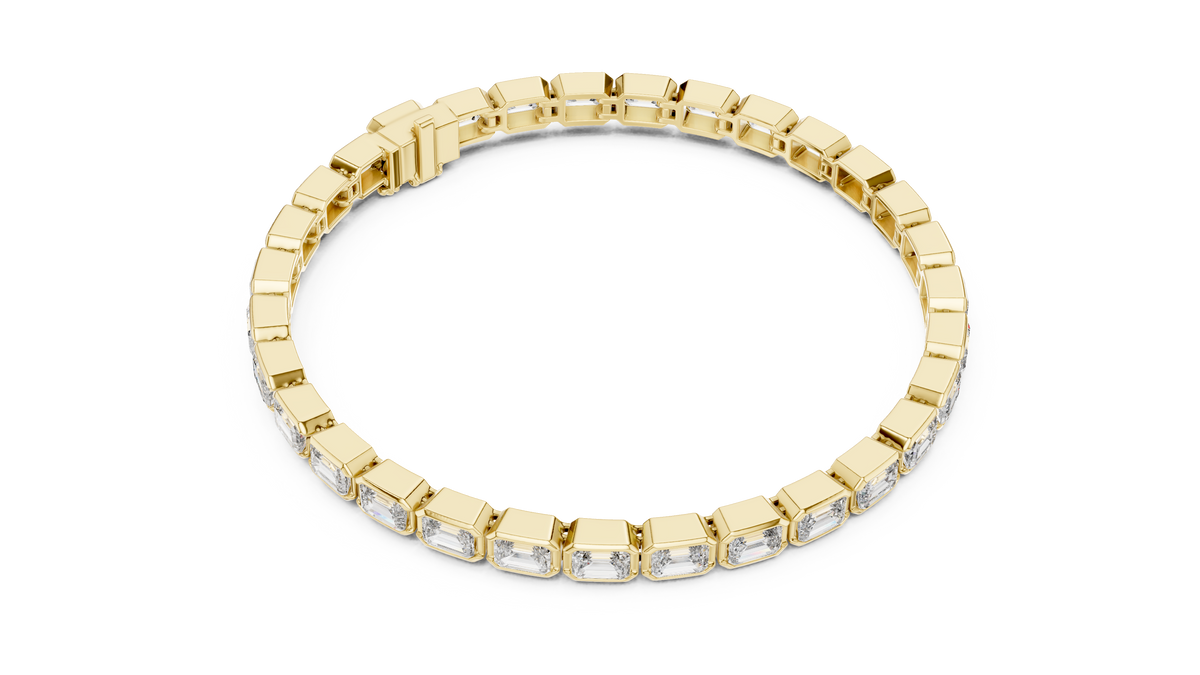 Yellow gold emerald cut bezel set diamond tennis bracelet, angled view