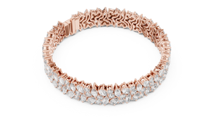 Rose gold marquise and pear diamond cluster bracelet, angled view