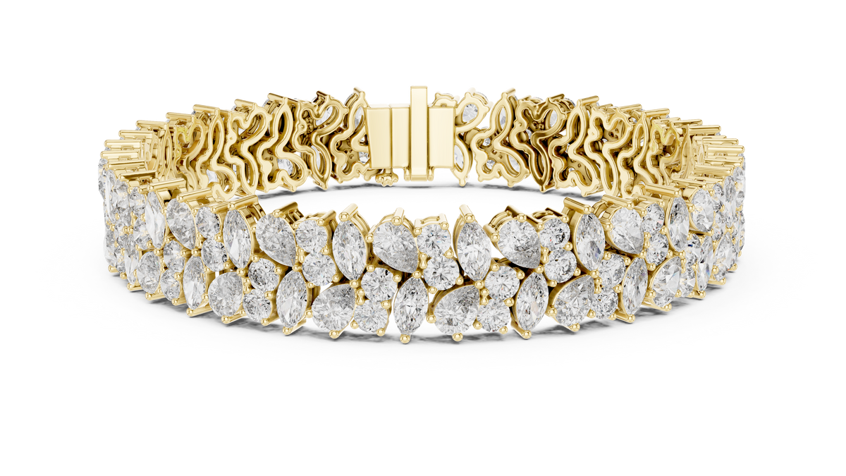 Yellow gold 13.50 ct marquise and pear diamond cluster bracelet, front view