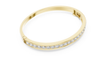 Yellow gold channel set diamond bangle bracelet, angled view