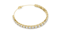 Yellow gold 8.07 ct graduated round diamond tennis bracelet, angled view