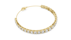 Yellow gold 8.07 ct graduated round diamond tennis bracelet, angled view