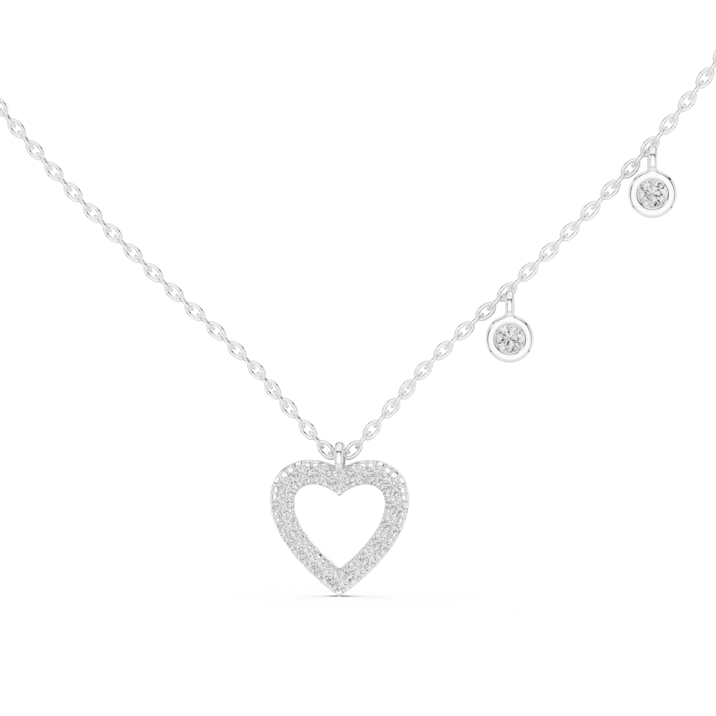 "Diamond heart-shaped pendant necklace with dangling diamond accent charms in silver or white gold"