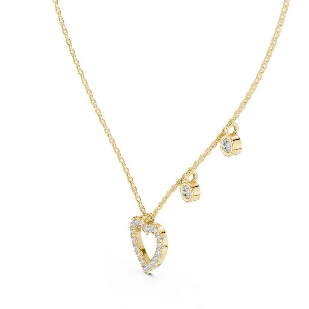 "yellow gold heart-shaped diamond pendant necklace with delicate dangling diamond charms"