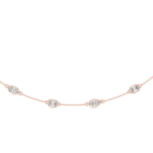Rose gold lab grown diamond station necklace, close-up of bezel-set diamonds