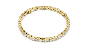 Yellow gold round cut lab grown diamond tennis bracelet, side view