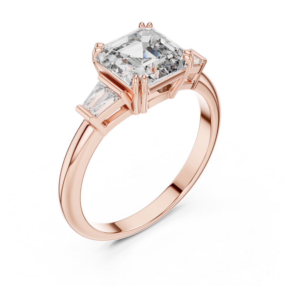 Emerald cut lab grown diamond three stone ring with baguette side stones in rose gold, front view