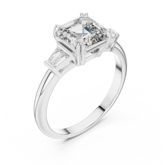 Emerald cut lab grown diamond three stone ring with baguette side stones in white gold, front view