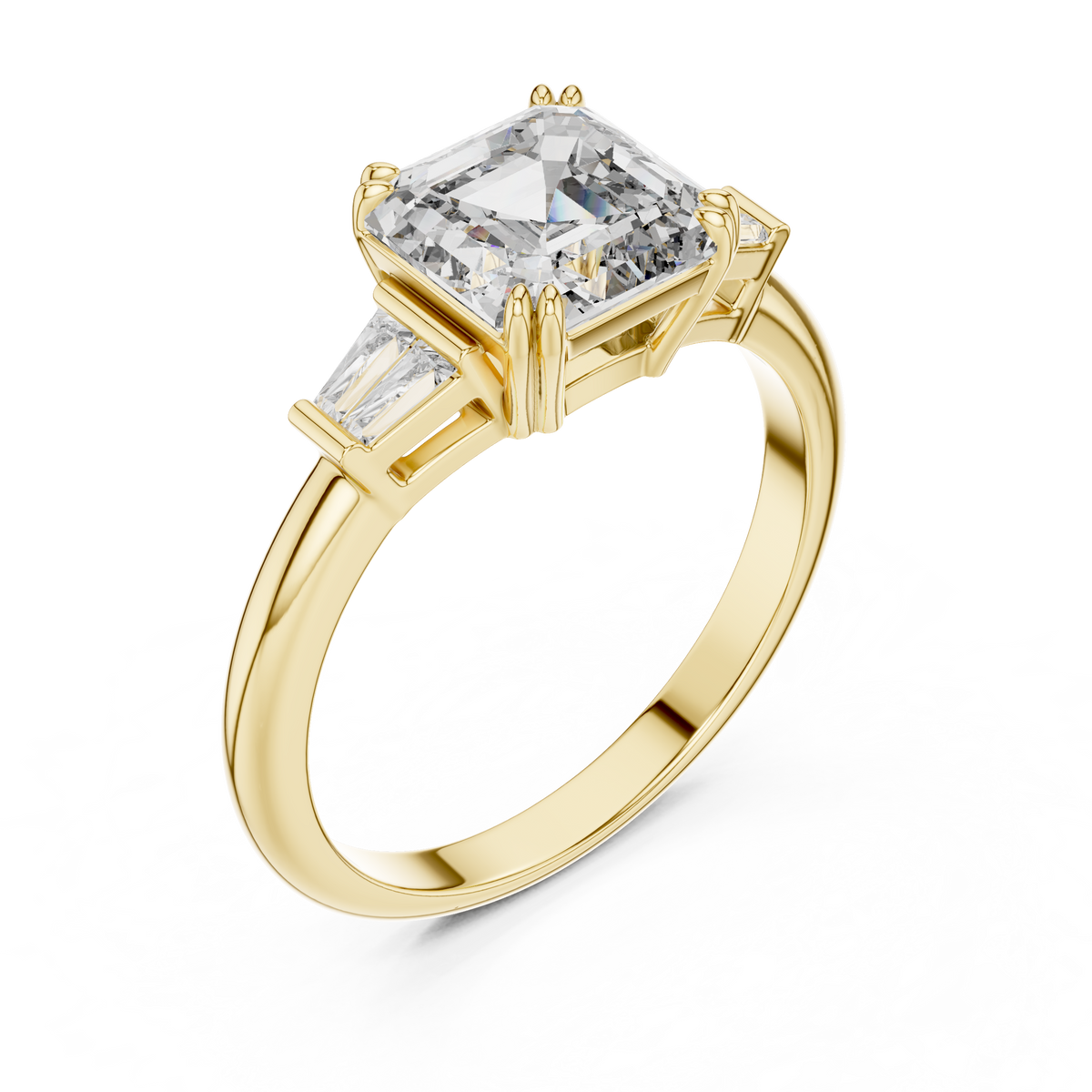 Emerald cut lab grown diamond three stone ring with baguette side stones in yellow gold, front view