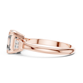 Emerald cut lab grown diamond three stone ring in rose gold, side view