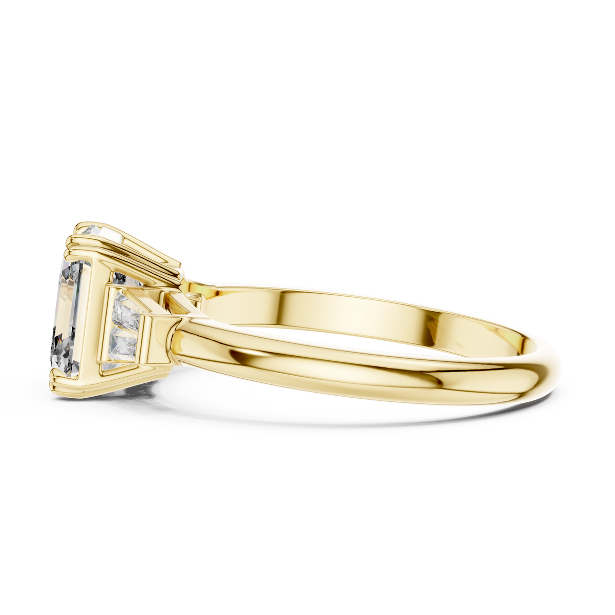 Emerald cut lab grown diamond three stone ring in yellow gold, side view